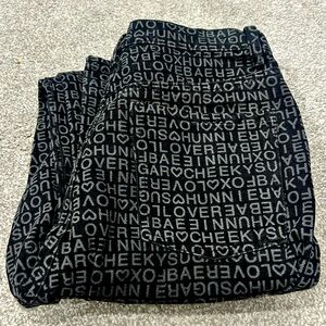 Princess Polly Slightly Flare Black with Word Pattern Jeans - Size 4